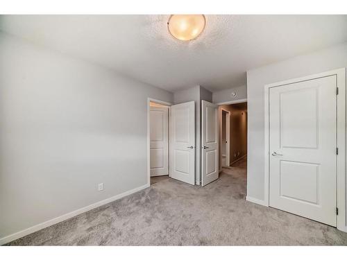 230 Aquila Drive Nw, Calgary, AB - Indoor Photo Showing Other Room