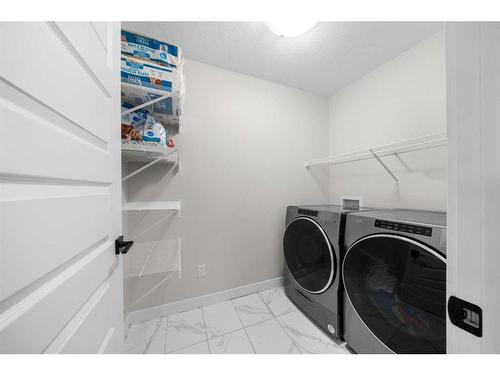 104 Sage Hill Crescent Nw, Calgary, AB - Indoor Photo Showing Laundry Room