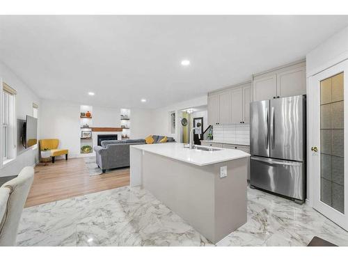 49 Morningside Bay Sw, Airdrie, AB - Indoor Photo Showing Kitchen With Stainless Steel Kitchen