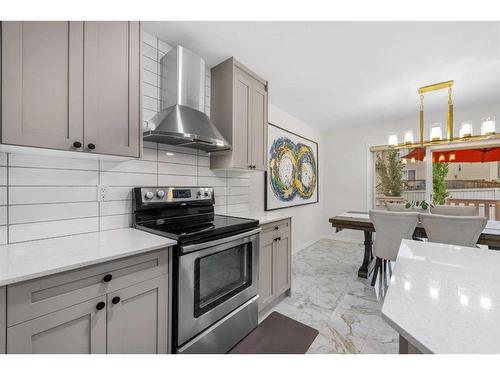 49 Morningside Bay Sw, Airdrie, AB - Indoor Photo Showing Kitchen