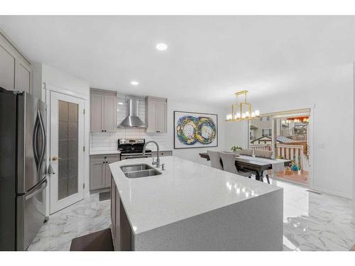 49 Morningside Bay Sw, Airdrie, AB - Indoor Photo Showing Kitchen With Double Sink