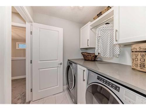 311 South Harmony Drive, Rural Rocky View County, AB - Indoor Photo Showing Laundry Room