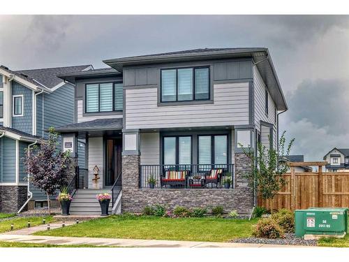 311 South Harmony Drive, Rural Rocky View County, AB - Outdoor With Deck Patio Veranda With Facade