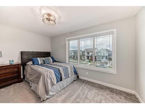 311 South Harmony Drive, Rural Rocky View County, AB - Indoor Photo Showing Bedroom