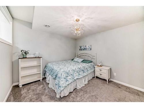 311 South Harmony Drive, Rural Rocky View County, AB - Indoor Photo Showing Bedroom