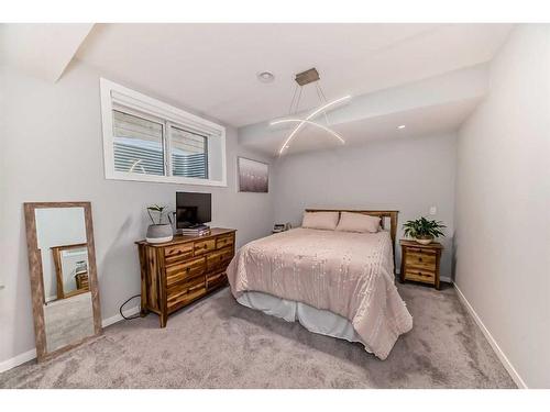 311 South Harmony Drive, Rural Rocky View County, AB - Indoor Photo Showing Bedroom