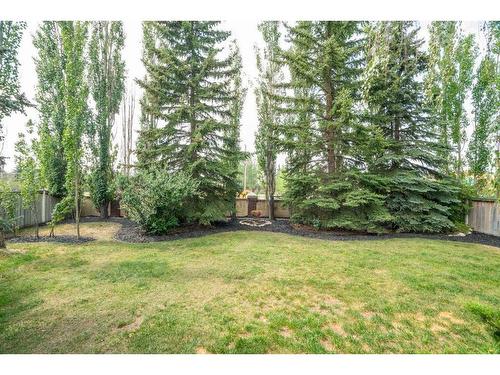 104 Christie Knoll Heights Sw, Calgary, AB - Outdoor With Backyard