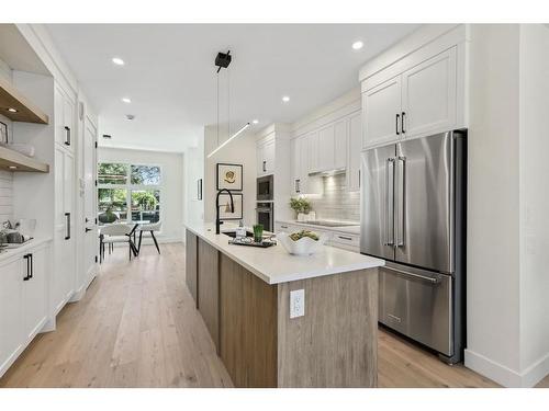 1423 Child Avenue Ne, Calgary, AB - Indoor Photo Showing Kitchen With Stainless Steel Kitchen With Upgraded Kitchen