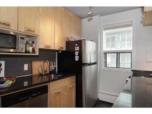 607-718 12 Avenue Sw, Calgary, AB - Indoor Photo Showing Kitchen With Stainless Steel Kitchen