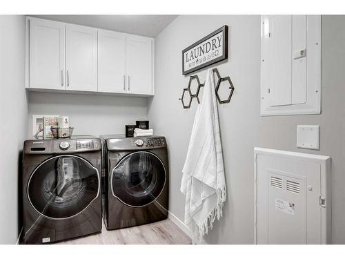 4313-550 Belmont Street Sw, Calgary, AB - Indoor Photo Showing Laundry Room