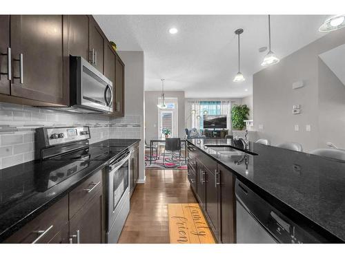 31 Nolanfield Terrace Nw, Calgary, AB - Indoor Photo Showing Kitchen With Stainless Steel Kitchen With Double Sink With Upgraded Kitchen