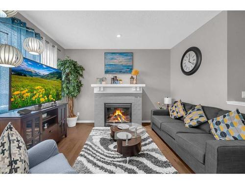 31 Nolanfield Terrace Nw, Calgary, AB - Indoor Photo Showing Living Room With Fireplace