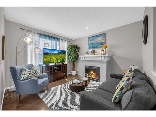 31 Nolanfield Terrace Nw, Calgary, AB - Indoor Photo Showing Living Room With Fireplace