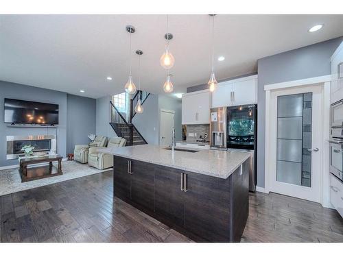 52 Cooperstown Place Sw, Airdrie, AB - Indoor Photo Showing Kitchen With Upgraded Kitchen