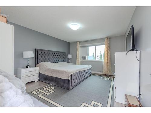 52 Cooperstown Place Sw, Airdrie, AB - Indoor Photo Showing Bedroom