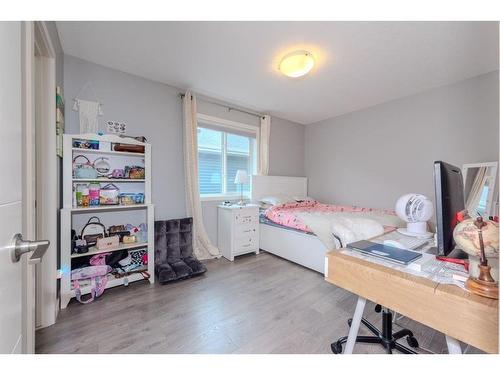 52 Cooperstown Place Sw, Airdrie, AB - Indoor Photo Showing Bedroom