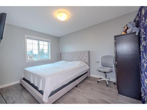 52 Cooperstown Place Sw, Airdrie, AB - Indoor Photo Showing Bedroom