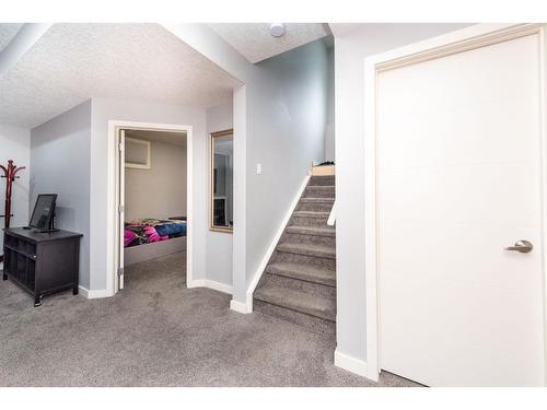 52 Cooperstown Place Sw, Airdrie, AB - Indoor Photo Showing Other Room