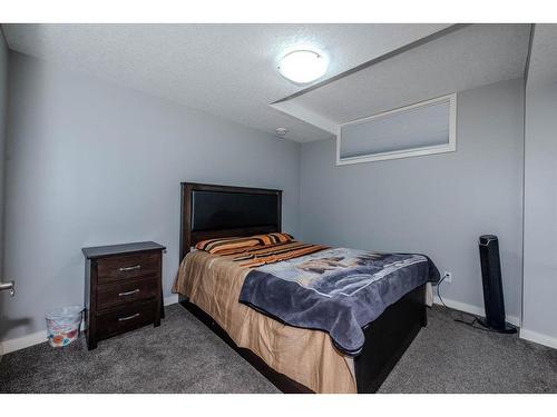 52 Cooperstown Place Sw, Airdrie, AB - Indoor Photo Showing Bedroom