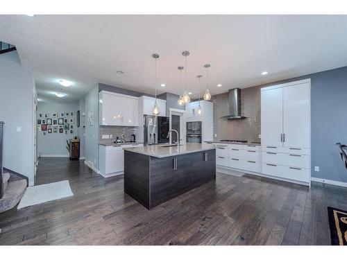 52 Cooperstown Place Sw, Airdrie, AB - Indoor Photo Showing Kitchen With Upgraded Kitchen