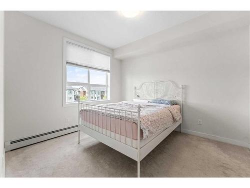 303-20 Walgrove Walk Se, Calgary, AB - Indoor Photo Showing Bedroom