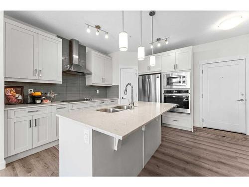 303-20 Walgrove Walk Se, Calgary, AB - Indoor Photo Showing Kitchen With Double Sink With Upgraded Kitchen