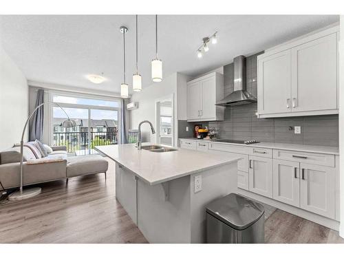 303-20 Walgrove Walk Se, Calgary, AB - Indoor Photo Showing Kitchen With Double Sink With Upgraded Kitchen