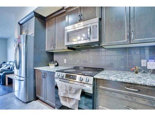 328 Cornerstone Passage Ne, Calgary, AB - Indoor Photo Showing Kitchen With Upgraded Kitchen