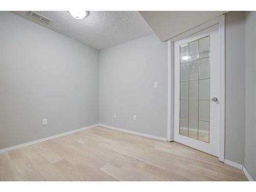 171 Erin Woods Drive Se, Calgary, AB - Indoor Photo Showing Other Room