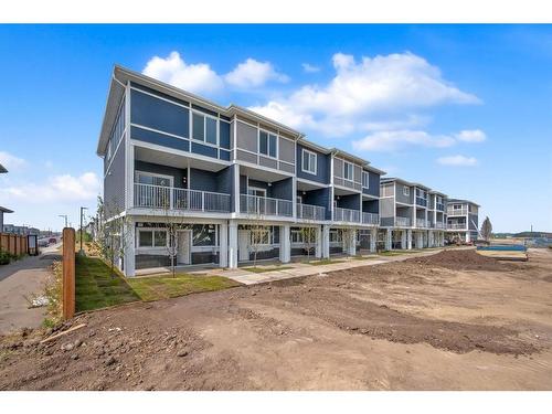 605-33 Merganser Drive West, Chestermere, AB - Outdoor With Balcony