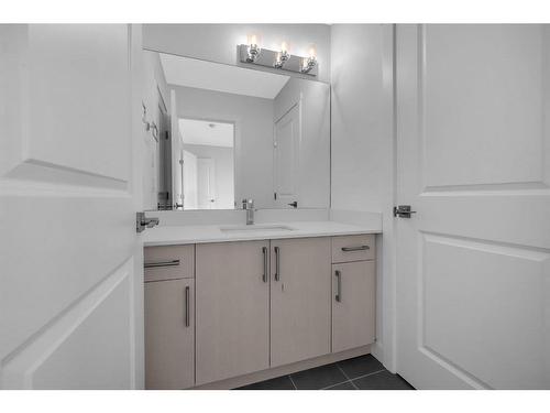 605-33 Merganser Drive West, Chestermere, AB - Indoor Photo Showing Bathroom