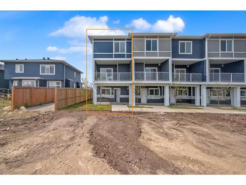 605-33 Merganser Drive West, Chestermere, AB - Outdoor With Balcony With Facade