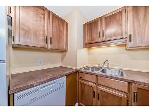 4602 Passchendaele Road Sw, Calgary, AB - Indoor Photo Showing Kitchen With Double Sink