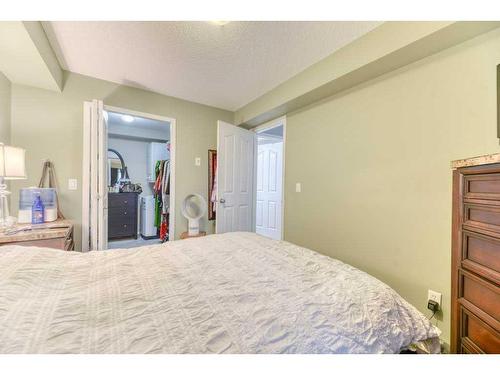 1211-60 Panatella Street Nw, Calgary, AB - Indoor Photo Showing Bedroom