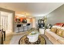 1211-60 Panatella Street Nw, Calgary, AB  - Indoor Photo Showing Living Room 