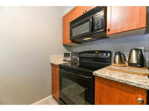 1211-60 Panatella Street Nw, Calgary, AB - Indoor Photo Showing Kitchen