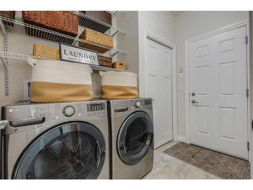 234 Baywater Way Sw, Airdrie, AB - Indoor Photo Showing Laundry Room