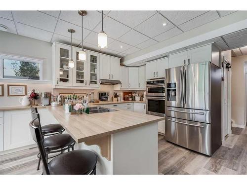 234 Baywater Way Sw, Airdrie, AB - Indoor Photo Showing Kitchen With Double Sink