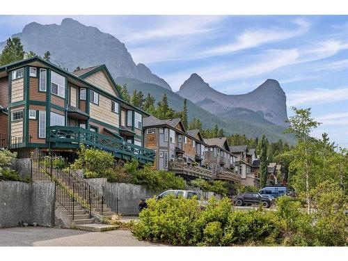 1-823 Wilson Way, Canmore, AB - Outdoor With Deck Patio Veranda