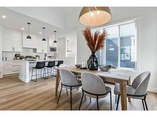 56 Drake Landing Square, Okotoks, AB - Indoor Photo Showing Dining Room