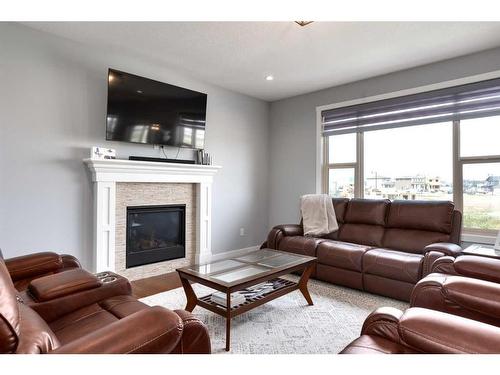 1604 Montrose Terrace East, High River, AB - Indoor Photo Showing Living Room With Fireplace