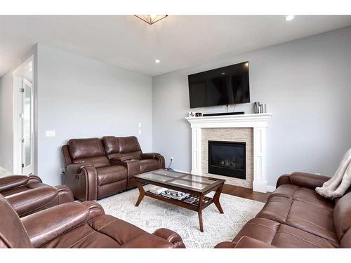 1604 Montrose Terrace East, High River, AB - Indoor Photo Showing Living Room With Fireplace