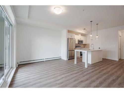 1110-200 Seton Circle Se, Calgary, AB - Indoor Photo Showing Kitchen