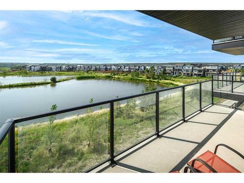 2205-42 Cranbrook Gardens Se, Calgary, AB - Outdoor With Body Of Water With Balcony With View