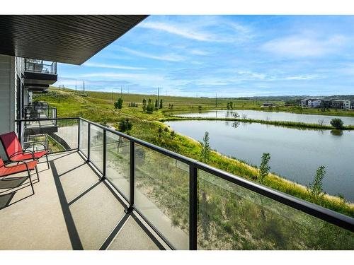 2205-42 Cranbrook Gardens Se, Calgary, AB - Outdoor With Body Of Water With Balcony With View