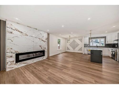 8628 Atlas Drive Se, Calgary, AB - Indoor With Fireplace