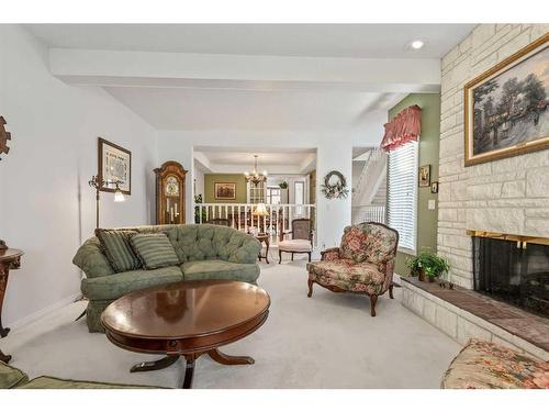 249-20 Midpark Crescent Se, Calgary, AB - Indoor Photo Showing Living Room With Fireplace