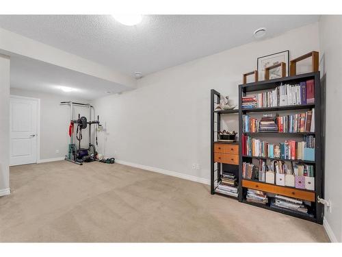 61 Sherwood Heights Nw, Calgary, AB - Indoor Photo Showing Gym Room