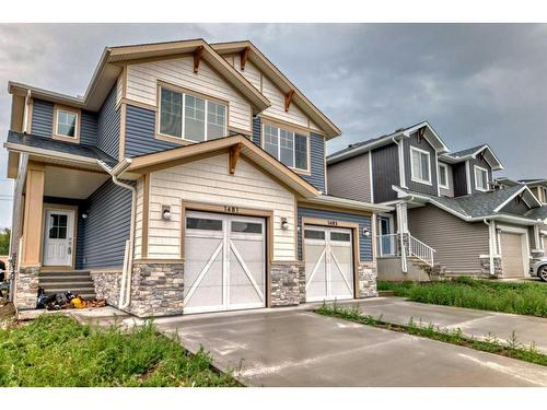 1481 Bayview Point, Airdrie, AB - Outdoor With Facade