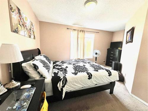 31 Martin Crossing Park Ne, Calgary, AB - Indoor Photo Showing Bedroom